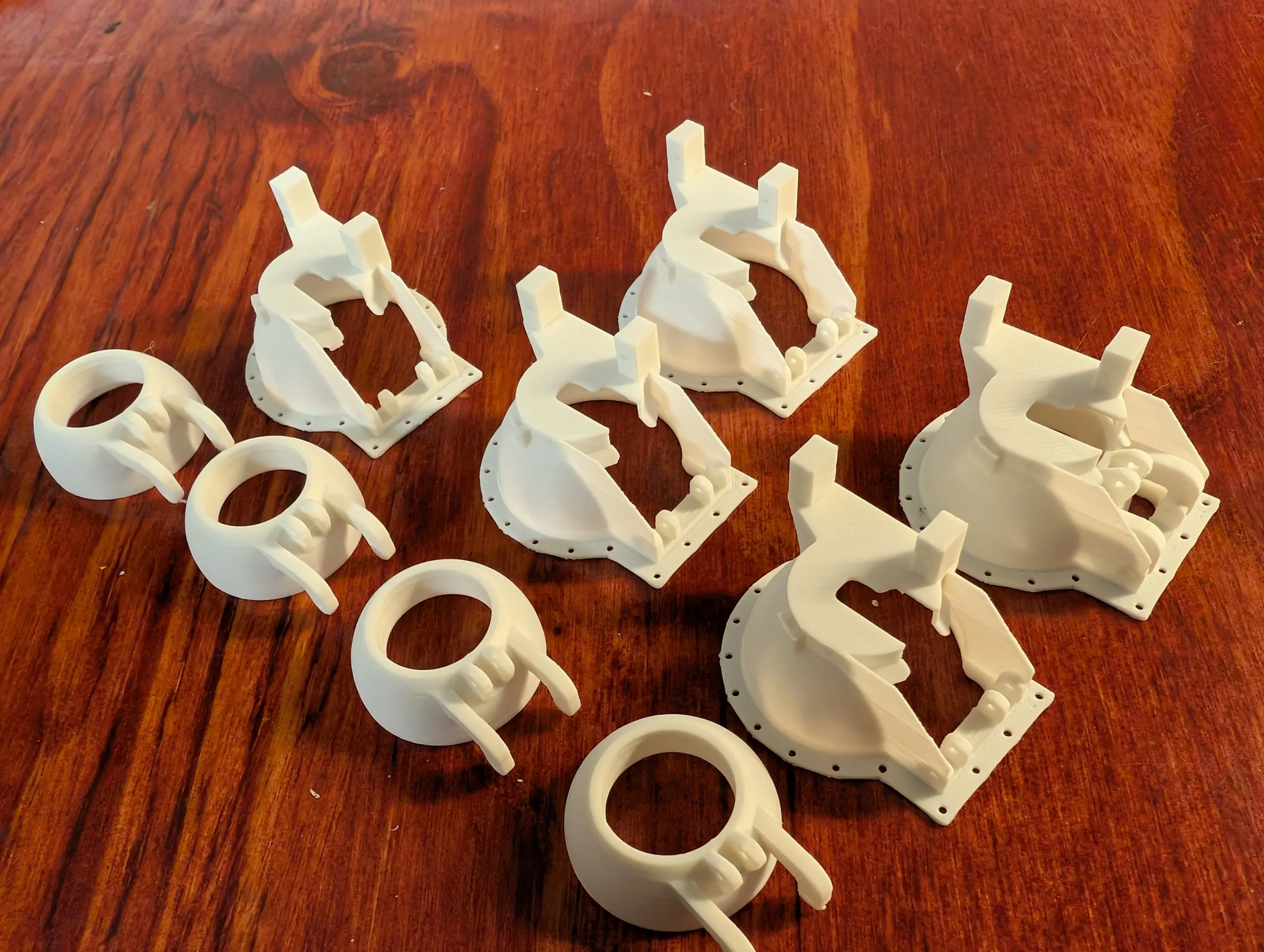 Batch of servo-driven lamp parts after test printing